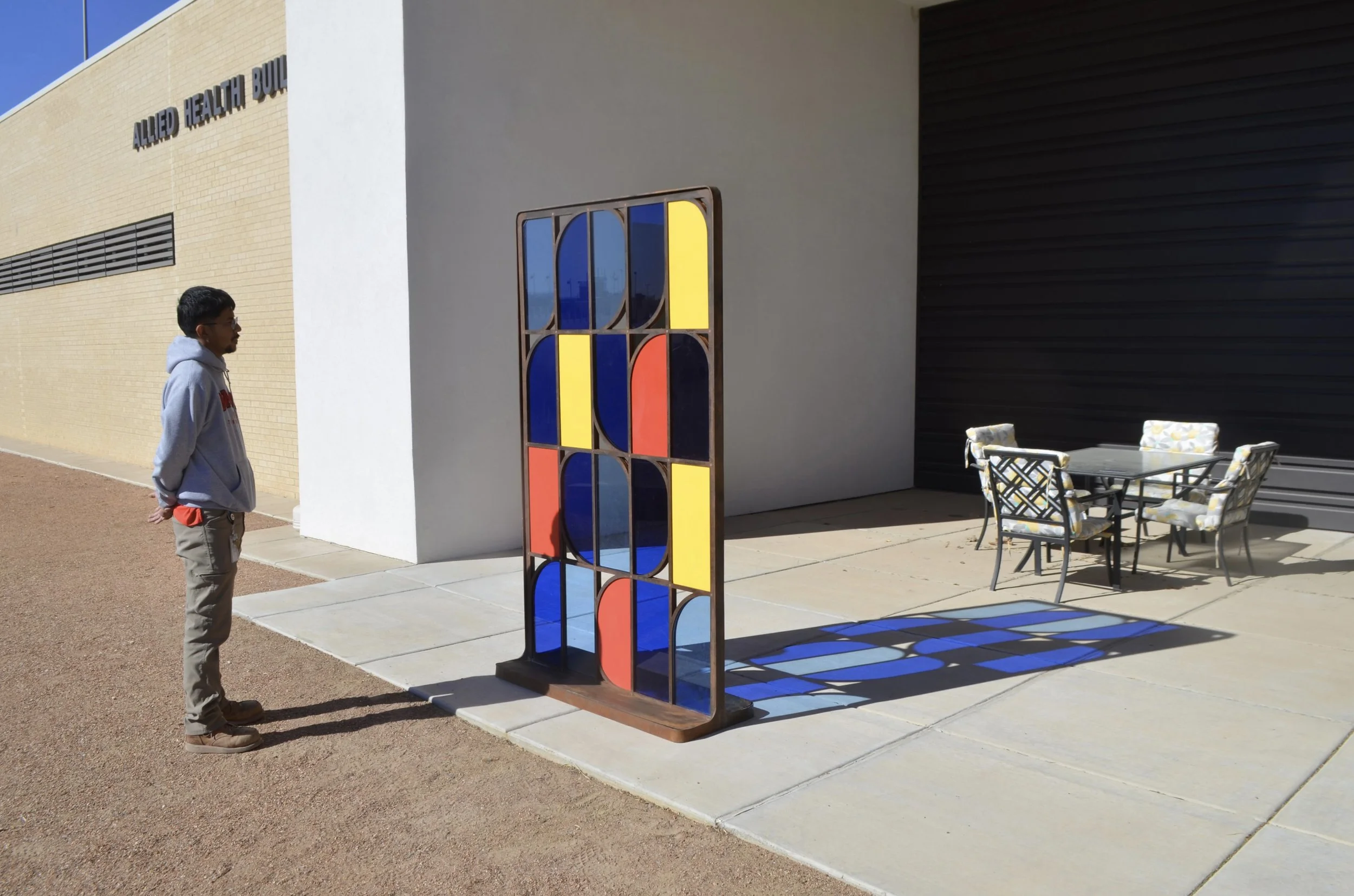   NMJC Window  was commissioned by New Mexico Arts and New Mexico Junior College in 2025. It has been installed at NMJC's Allied Health Building, a nursing school. NMJC chose school colors for the sculpture. 