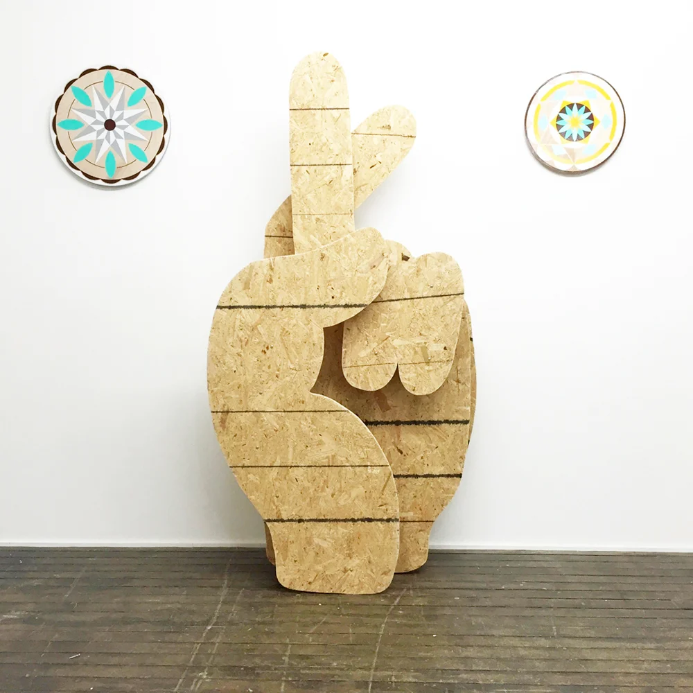 Fingers Crossed with Two Hex Signs, 2016
