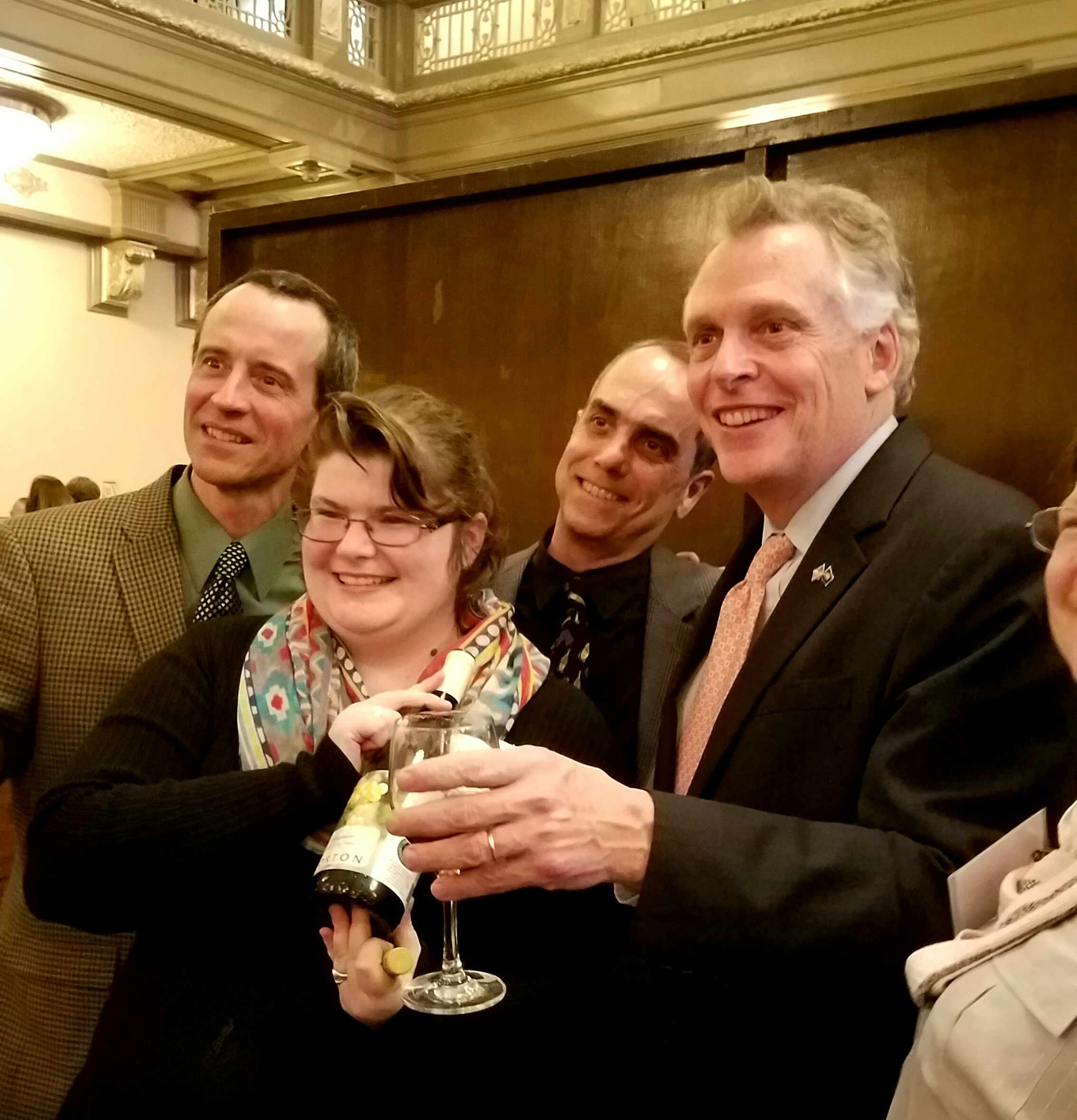 Virginia governor terry mc auliffe celebrated with the award winning winemakers at last nght's gala, here lifTing a glass with the team from horton vineyards who produced a gold medal winning vigonier.