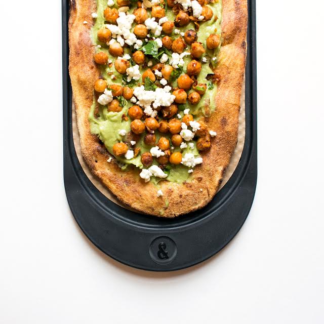 Pizza avocado toast for breakfast at &pizza. (photo courtesy of &pizza)