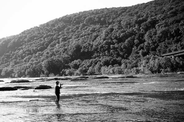 Tarver casts in the early morning on the Shenandoah River.