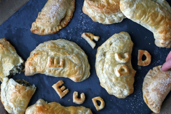 “Defined loosely, a hand pie is a circle of dough stuffed with a sweet or savory filling, folded into a half-moon shape, and crimped along the edges,” Susan Lutz writes.