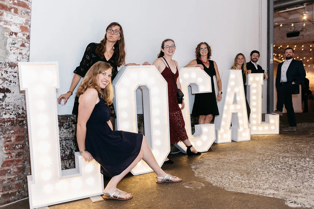 The FRESHFARM team with our LOCAL letters provided by BRIGHTLY EVER AFTER.