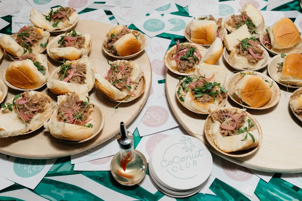 Chef Adam Greenberg serves Kalua Pork Sliders from Coconut Club.