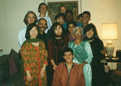 Yassine as a student in Montezuma, NM, surrounded by classmates from around the globe