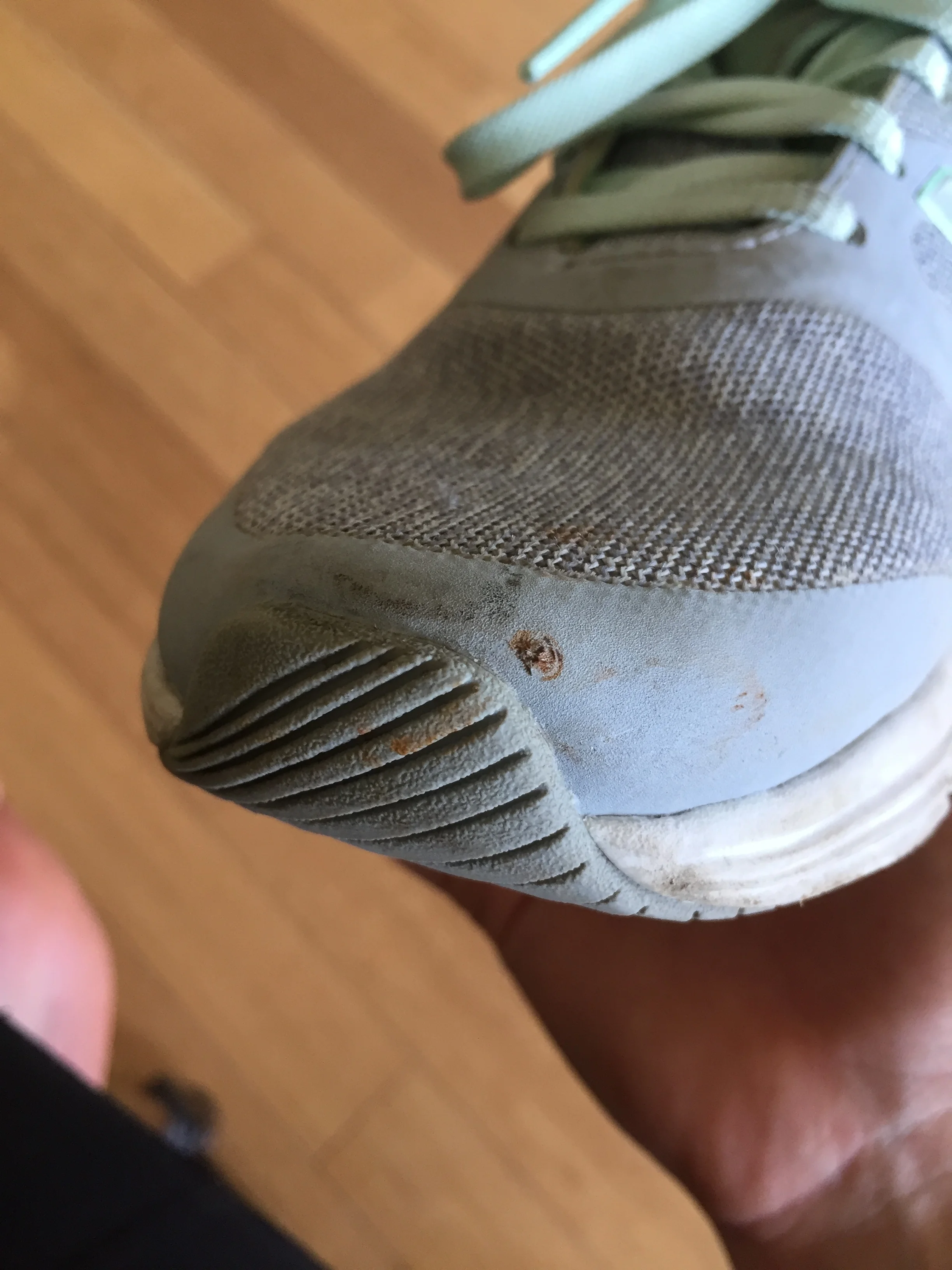 That cute little brown pinhole is where the not so cute, incredibly rusty finish nail went through my shoe and into the tip of my right big toe.