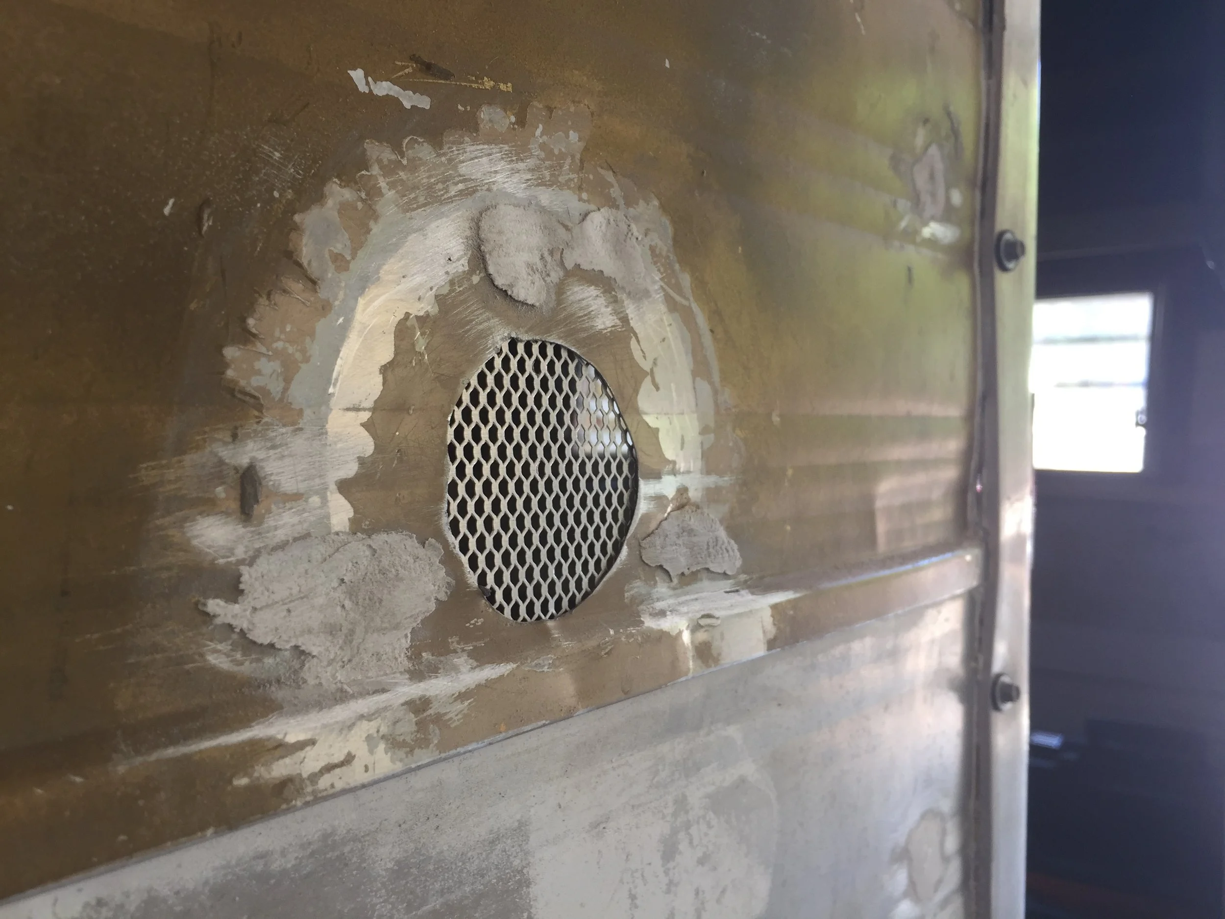 The Cameo Camper Renovation: Repairing holes in aluminum exterior walls + prepping for paint