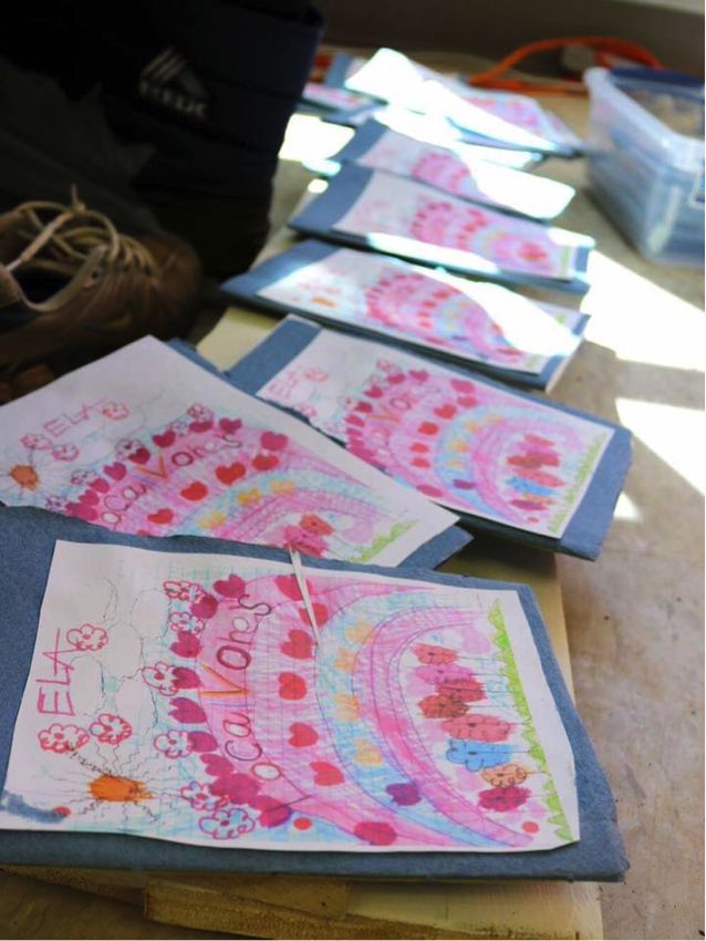Handmade cookbooks, created by students in the Localvore special education program at Trumansburg Middle School. Photo by Laura Rowley.