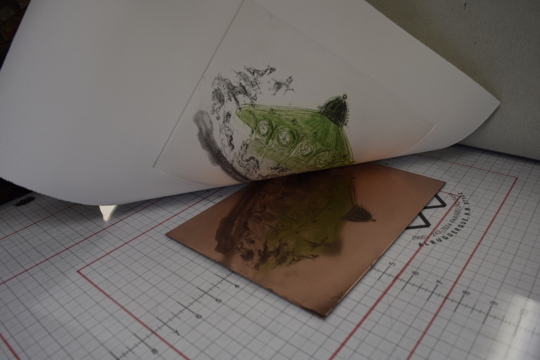 A print of Helen Frank’s etching being pulled.