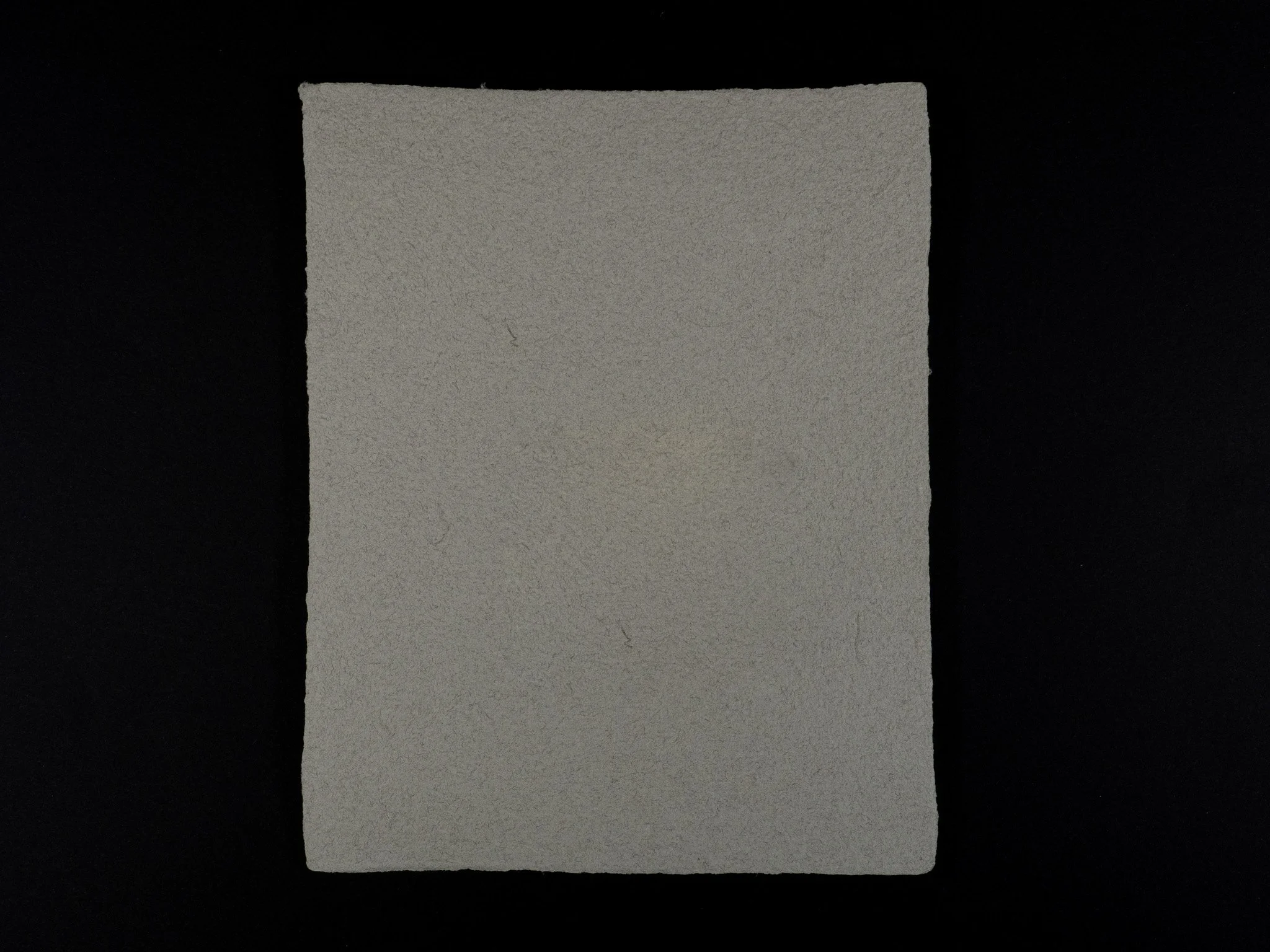 8 inch by 10 inch handmade paper made from Desert Tan Camo uniform and World War 2 Ike Wool.