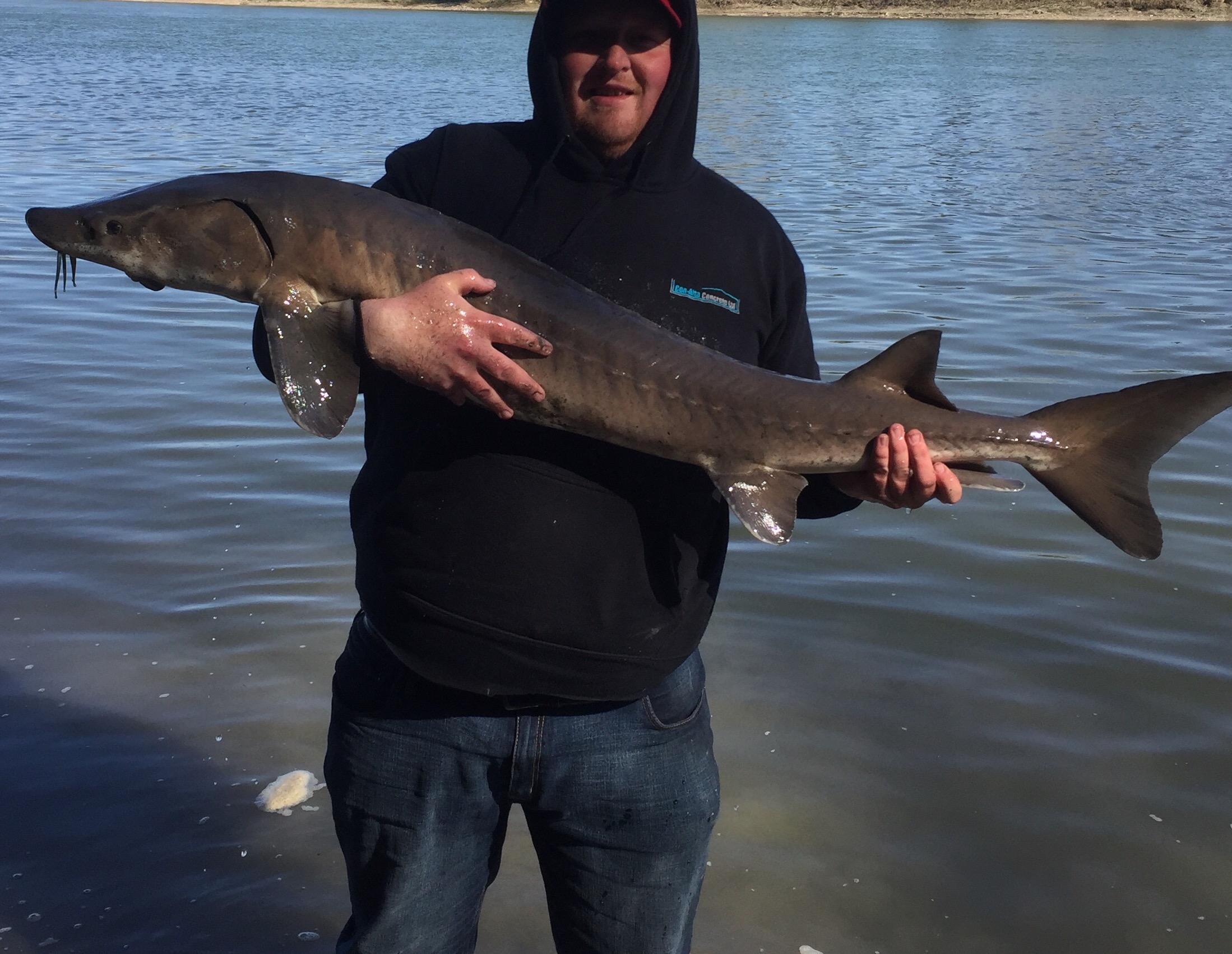 My good buddy Ainsley and his sturgeon. This guys know how to get them hooked up!