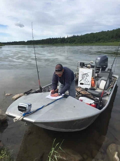 Stugeon guide Nick, Mapping out new country on the North Saskatchewan River. We love to fish where no one else does.