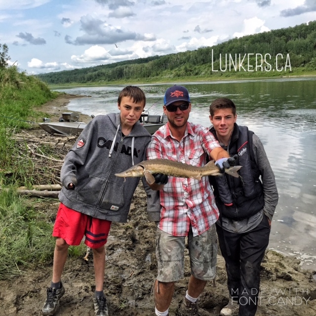 Garth's crew of youngsters and their second sturgeon of the day!