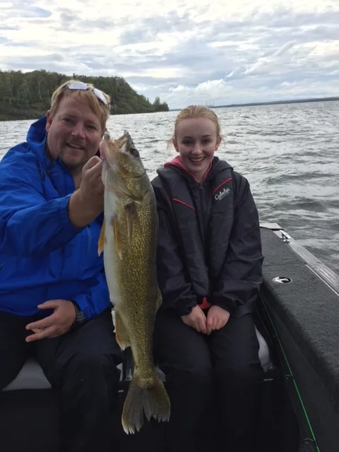 Hooking up to some dandy walleye's on one of our lake fishing tours. Edmonton, Alberta, Canada.