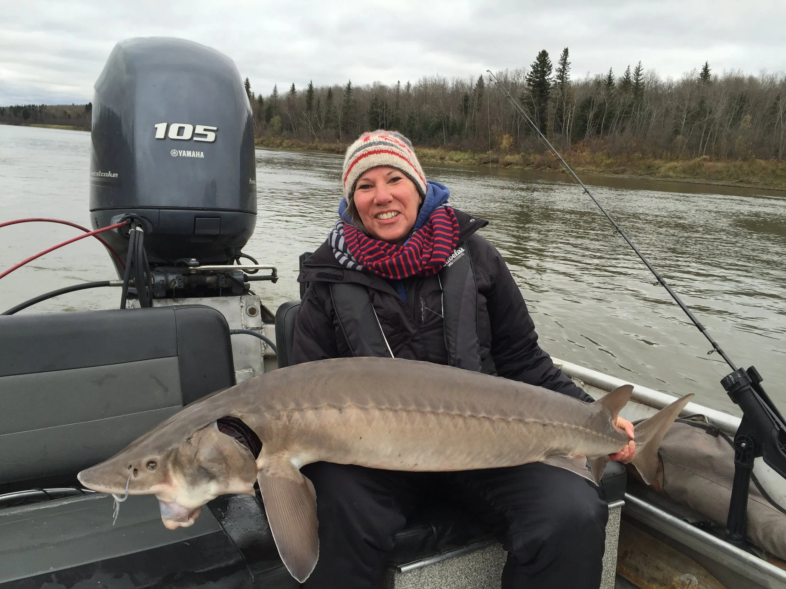 Betty and a monster lake sturgeon!