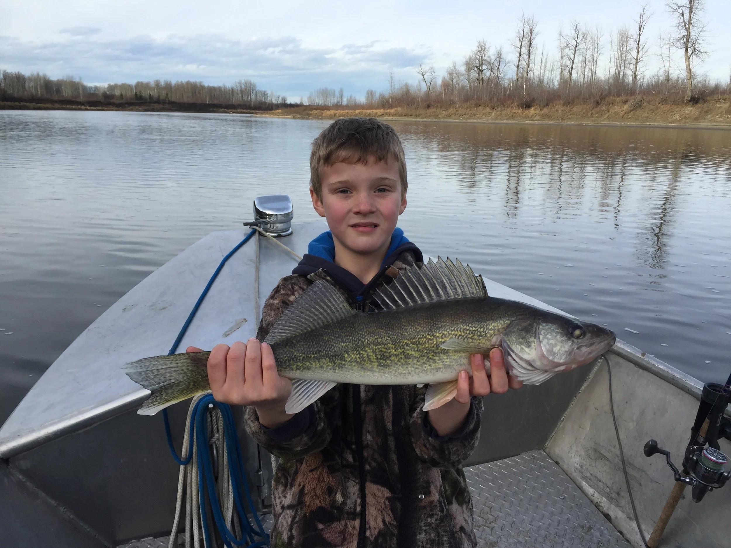 Young Brock and a great fall Walleye.