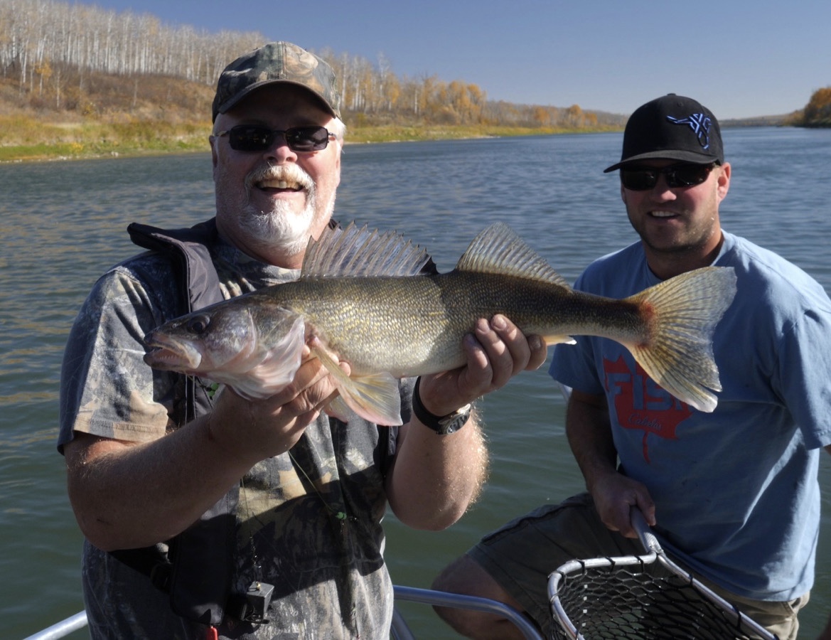 Randy with a dandy of a fall walleye on the beautiful North Saskatchewan River with Lunkers