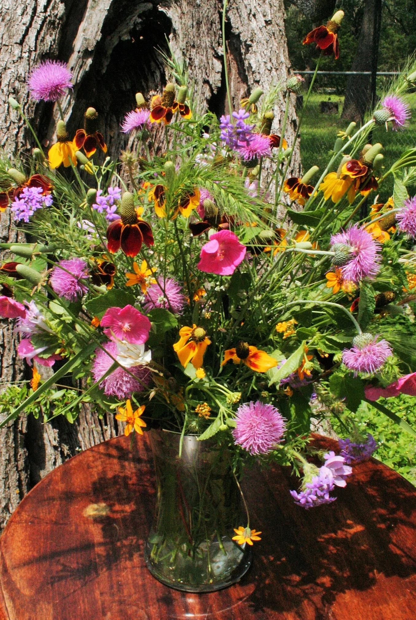 A community of flowers. Each one unique. Each bringing its own contribution, its own flaw, its own personality. The beauty is enhanced by the combination.