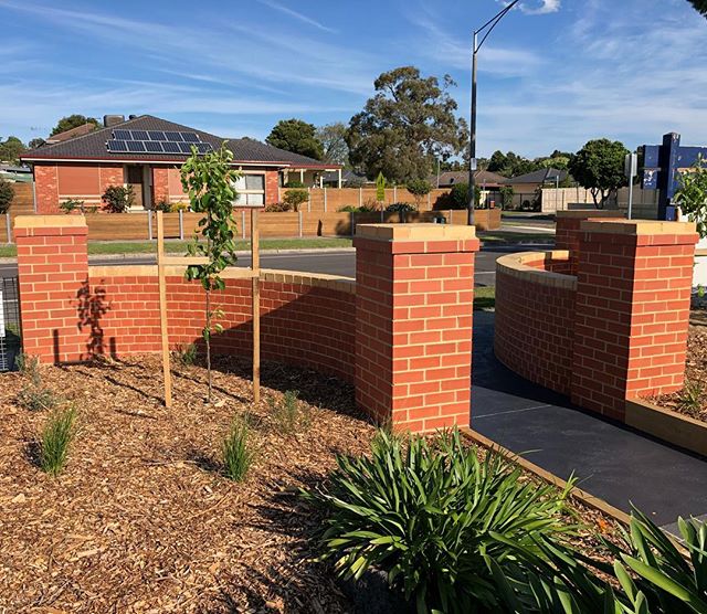 Brick Entry Piers at Mossgiel Park Primary School 🙌🔥 a beautiful contrasting palette with red brick and greenery ✅❤️ #landscaping #bricks #brickporn #entryway