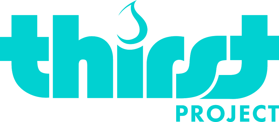 Logo for the Thirst Project with the word 'thirst' in large blue letters and a water droplet above the letter 'i', and the word 'PROJECT' in smaller blue letters underneath.
