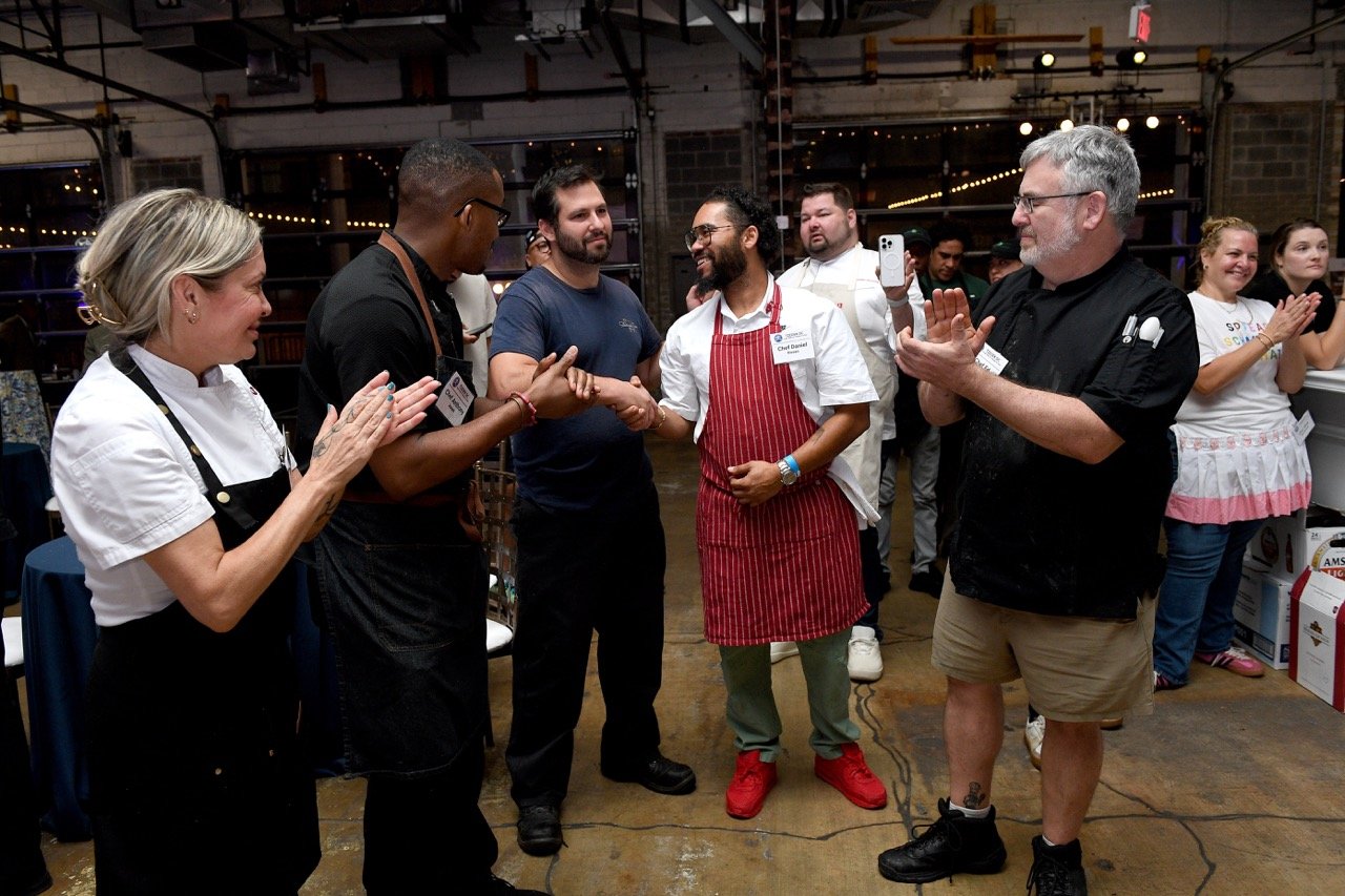 Chefs Daniel Rosen & Jarrad Silver shake hands Large.jpeg