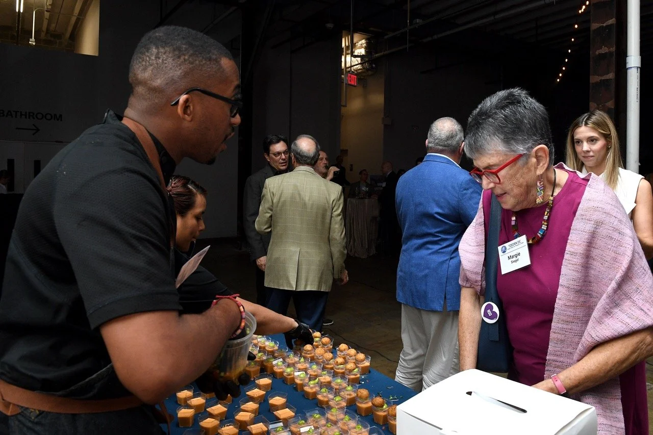 Margie Siegel talking to Anthony Jones Large.jpeg