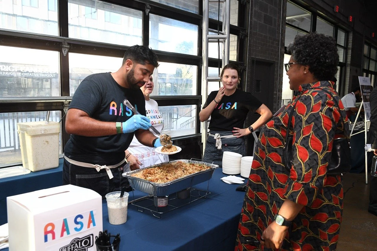 Rahul Vinod & Gina Chersevani serving their dish 2 Large.jpeg