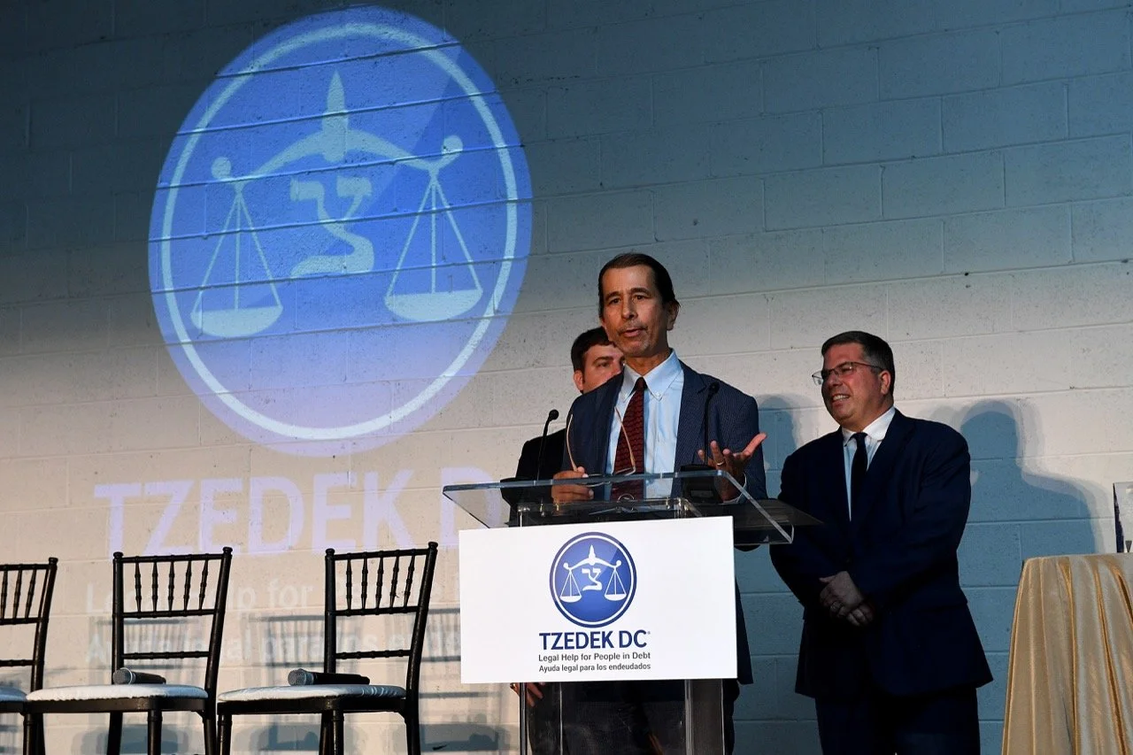 Rene (Orrick) at podium 2 Large.jpeg
