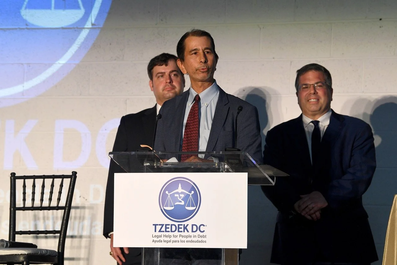Rene (Orrick) at podium, close up Large.jpeg
