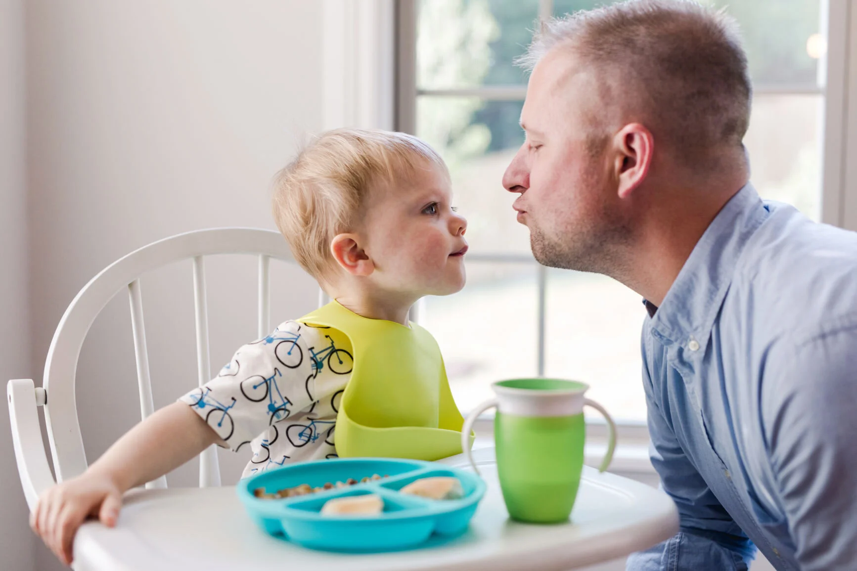 Dad kissing baby.jpg