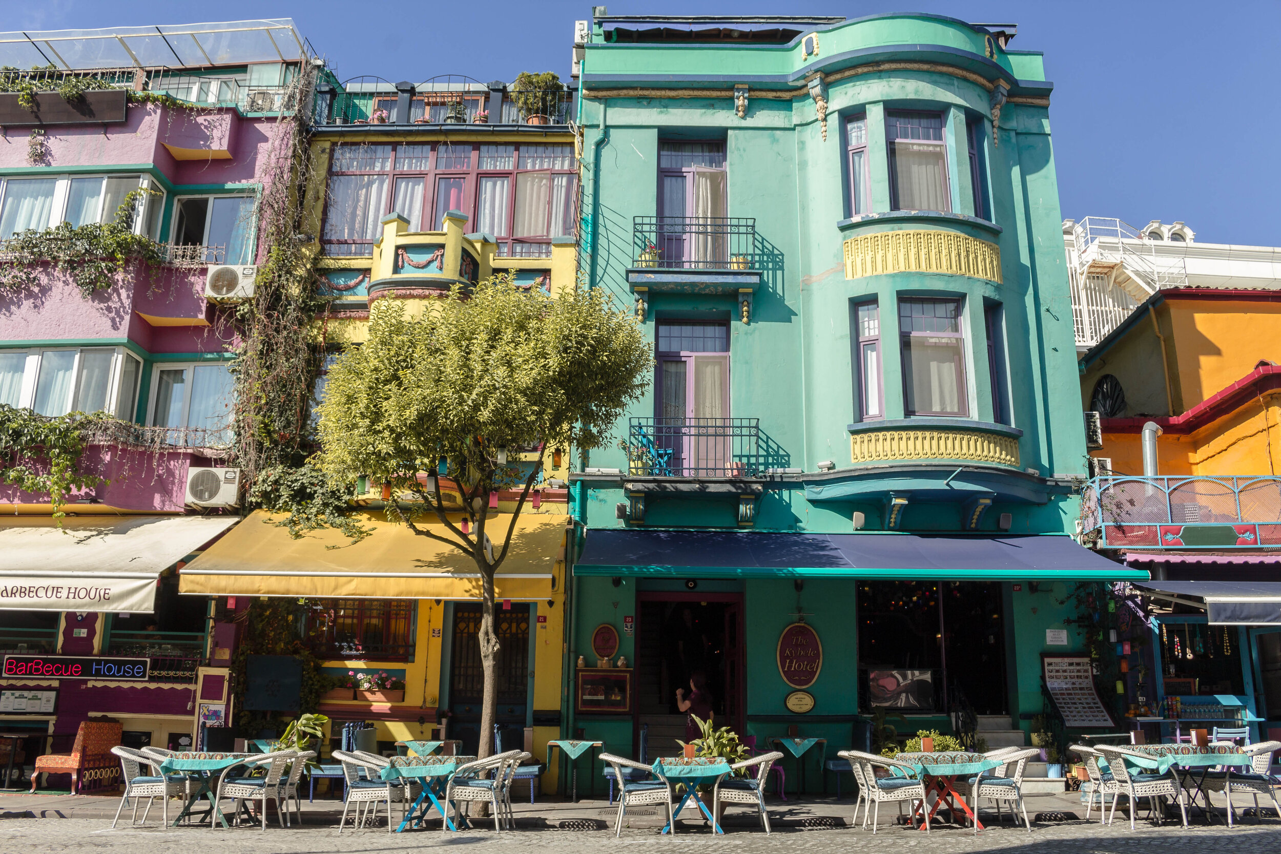 a colourful street with outdoor seating in Istanbul, Turkey