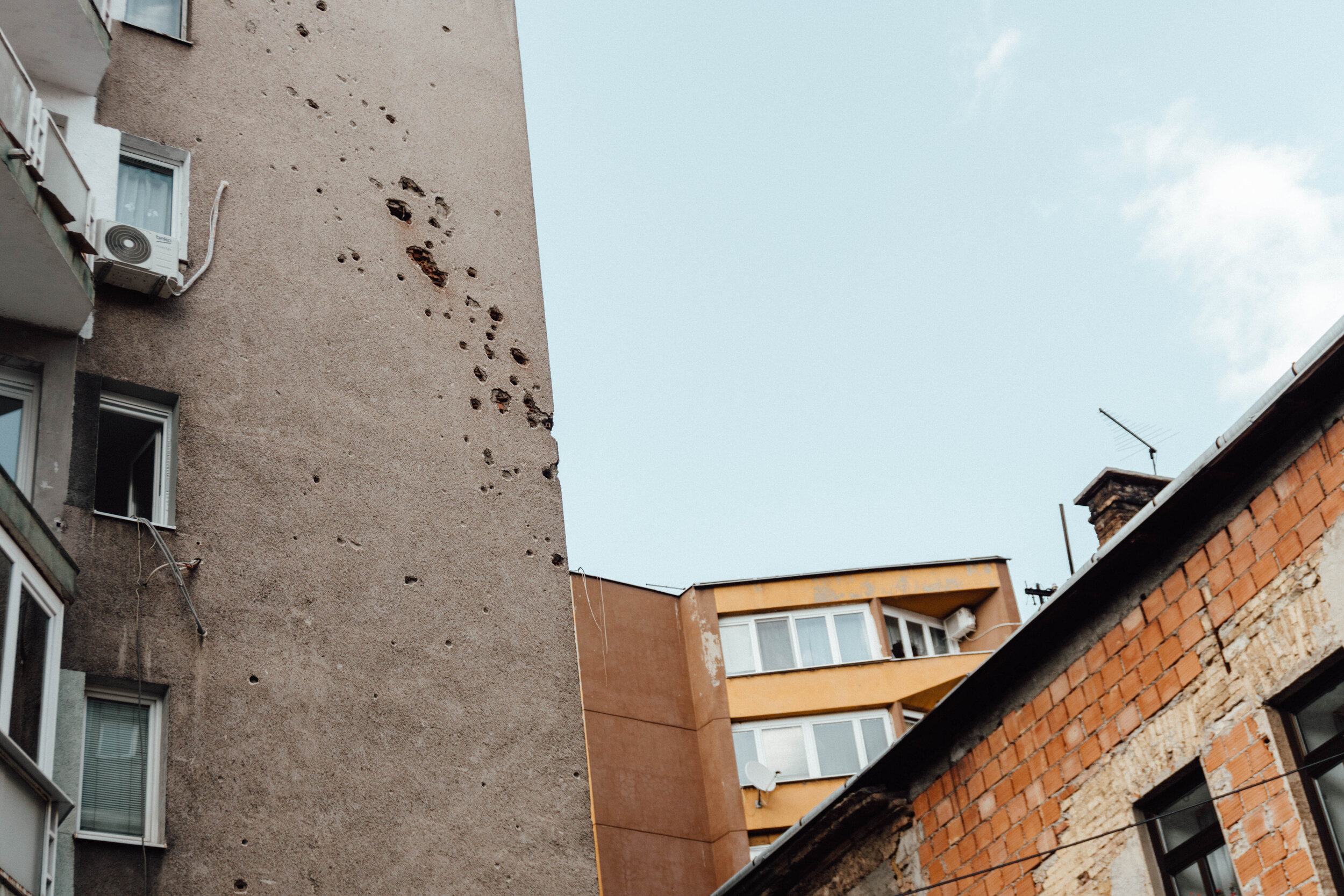 bullet holes in a building in Sarajevo, Bosnia and Herzegovina