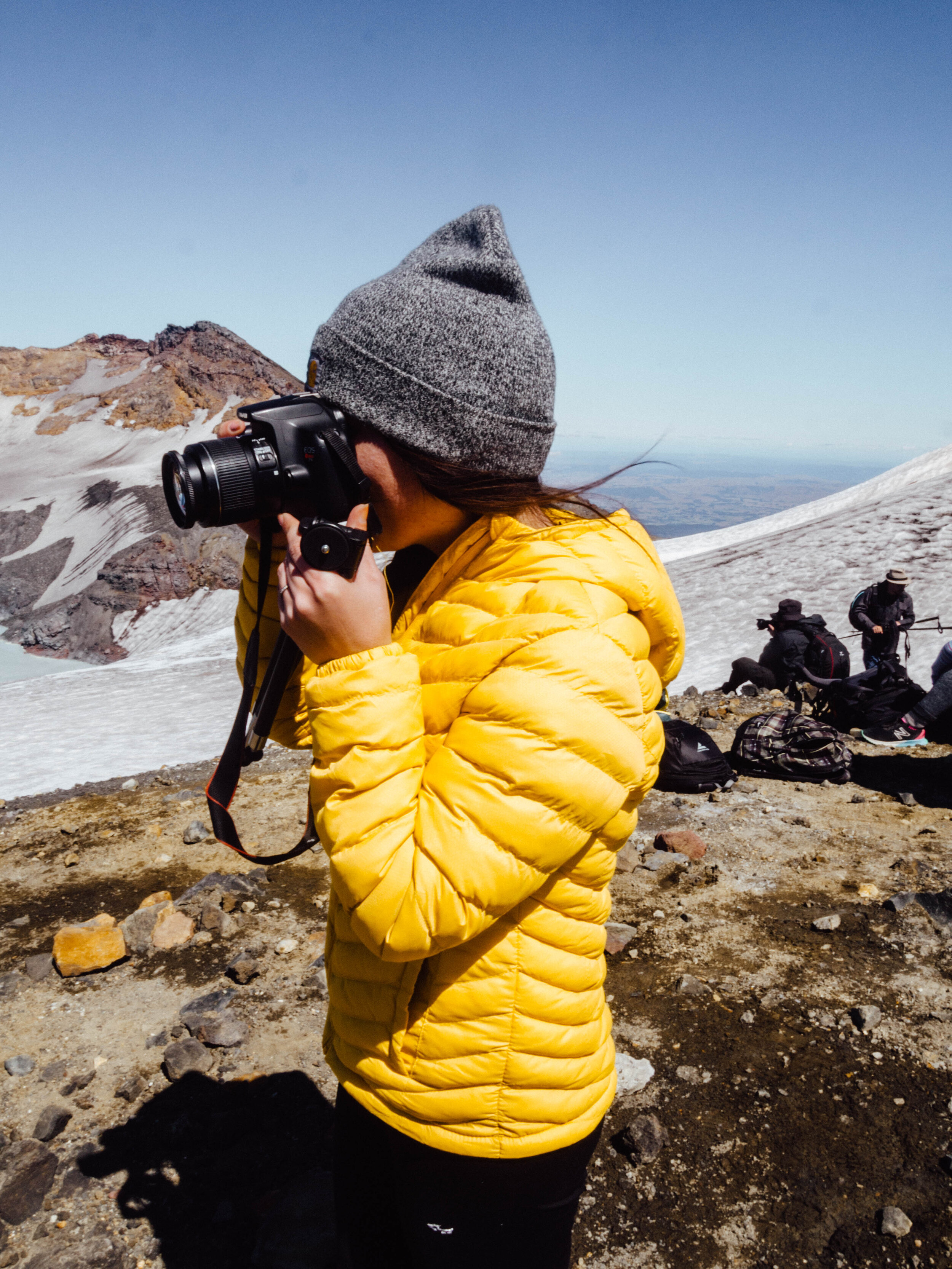 take photos on the trail up Mount Ruapehu, New Zealand