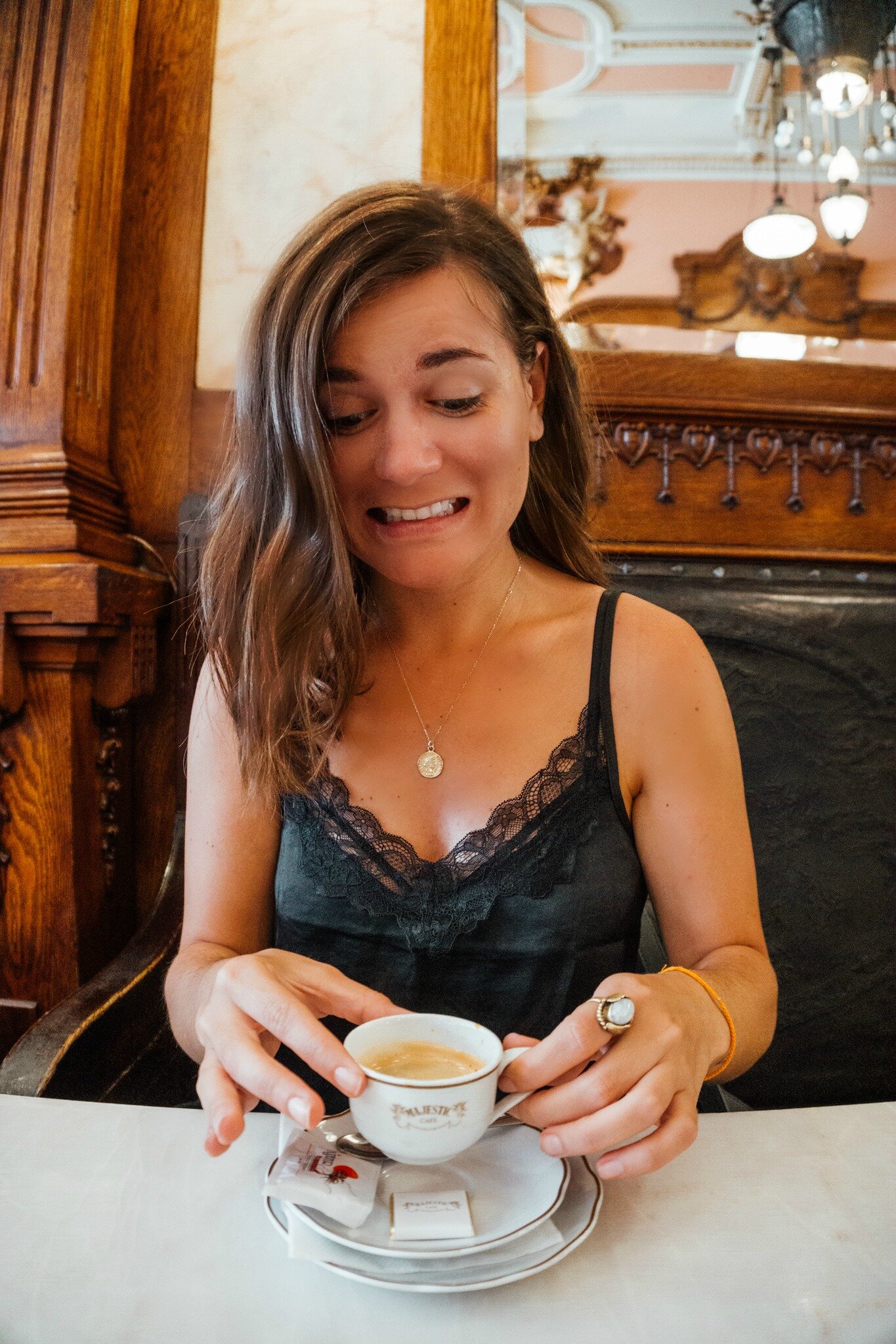drinking coffee at Majestic Coffee, Porto, Portugal