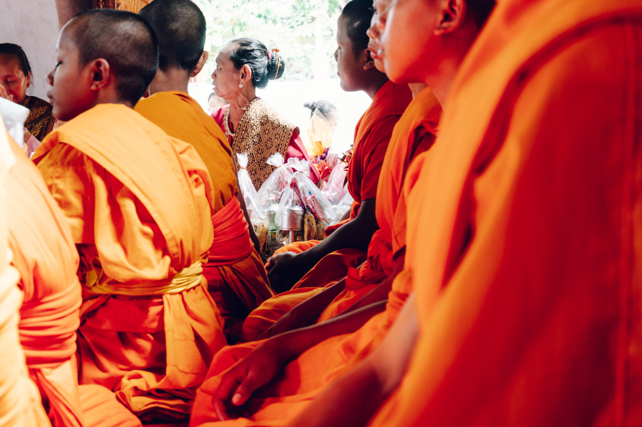 Novice Monks inside a temple in Luang Prabang