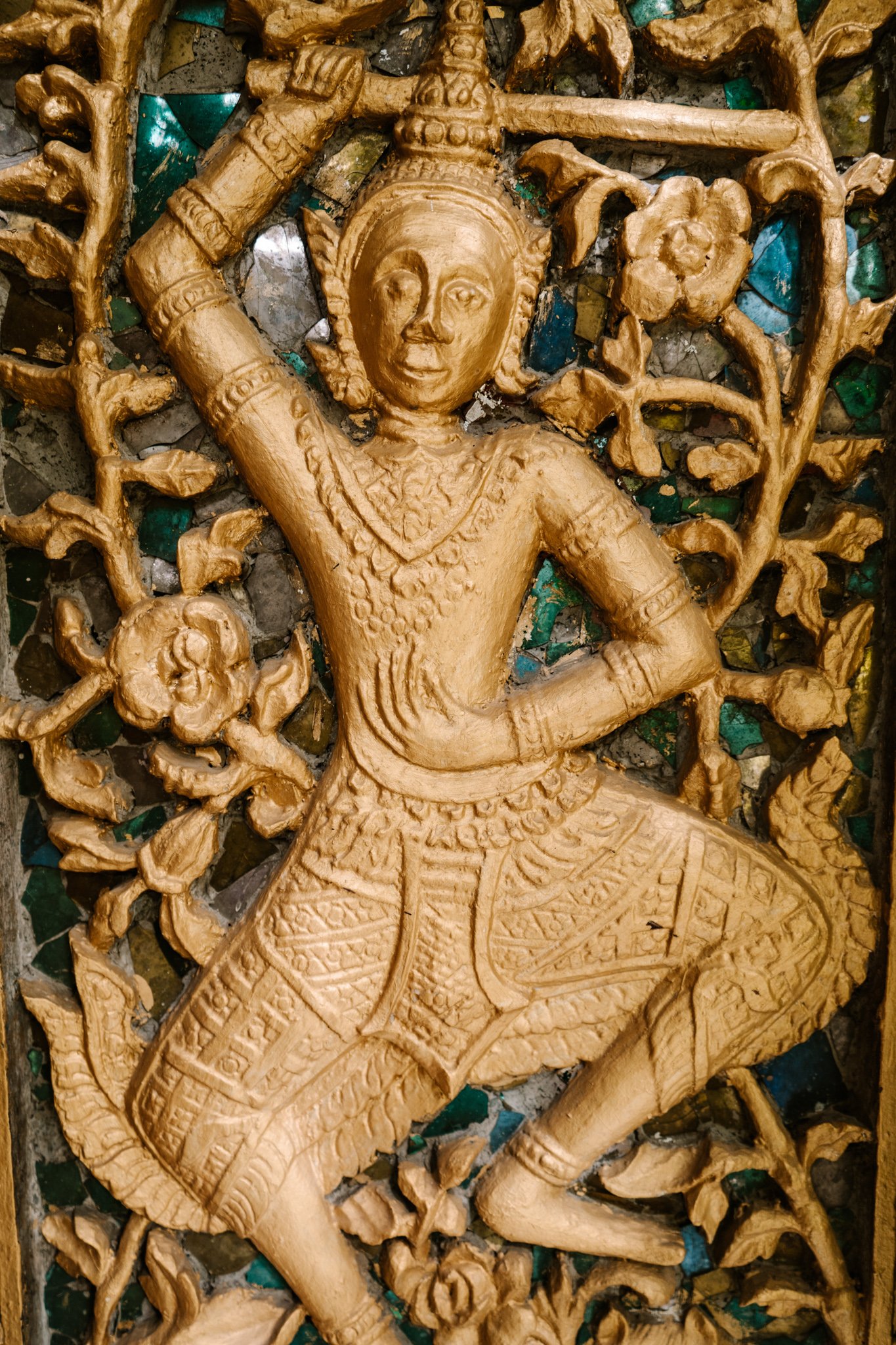 a temple carving in Luang Prabang
