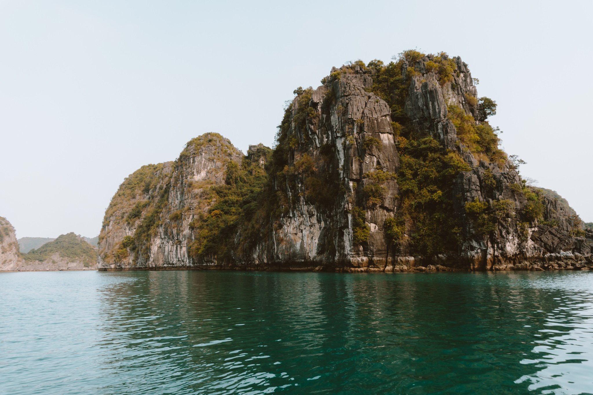 Views of the moss covered islands in Ha Long bay, Vietnam