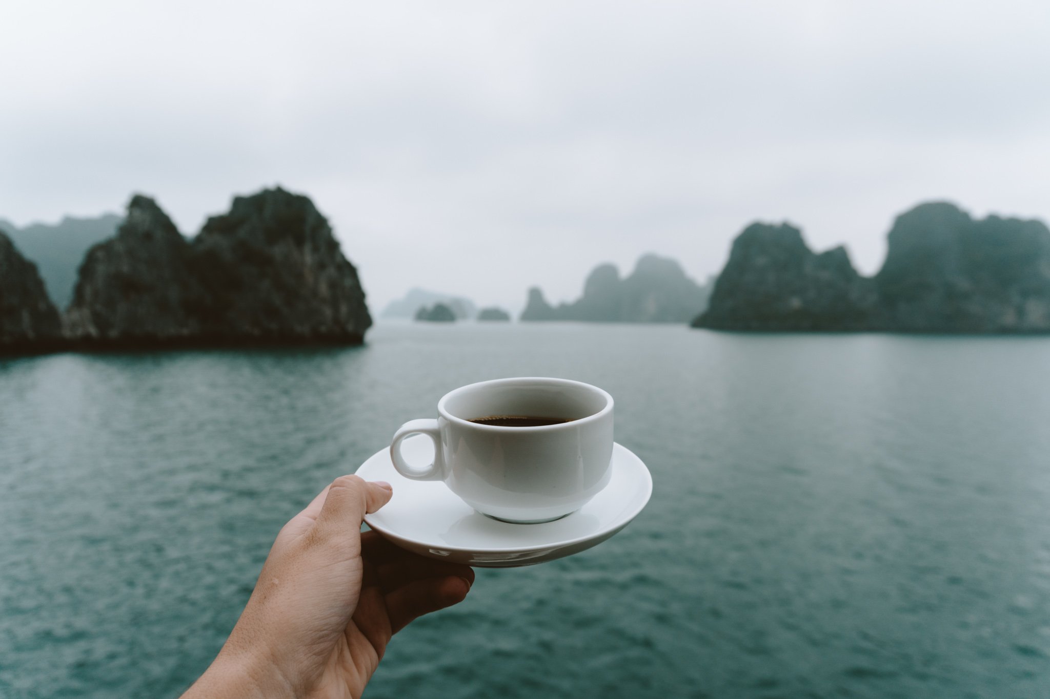 Morning coffee overlooking Ha Long Bay, Vietnam