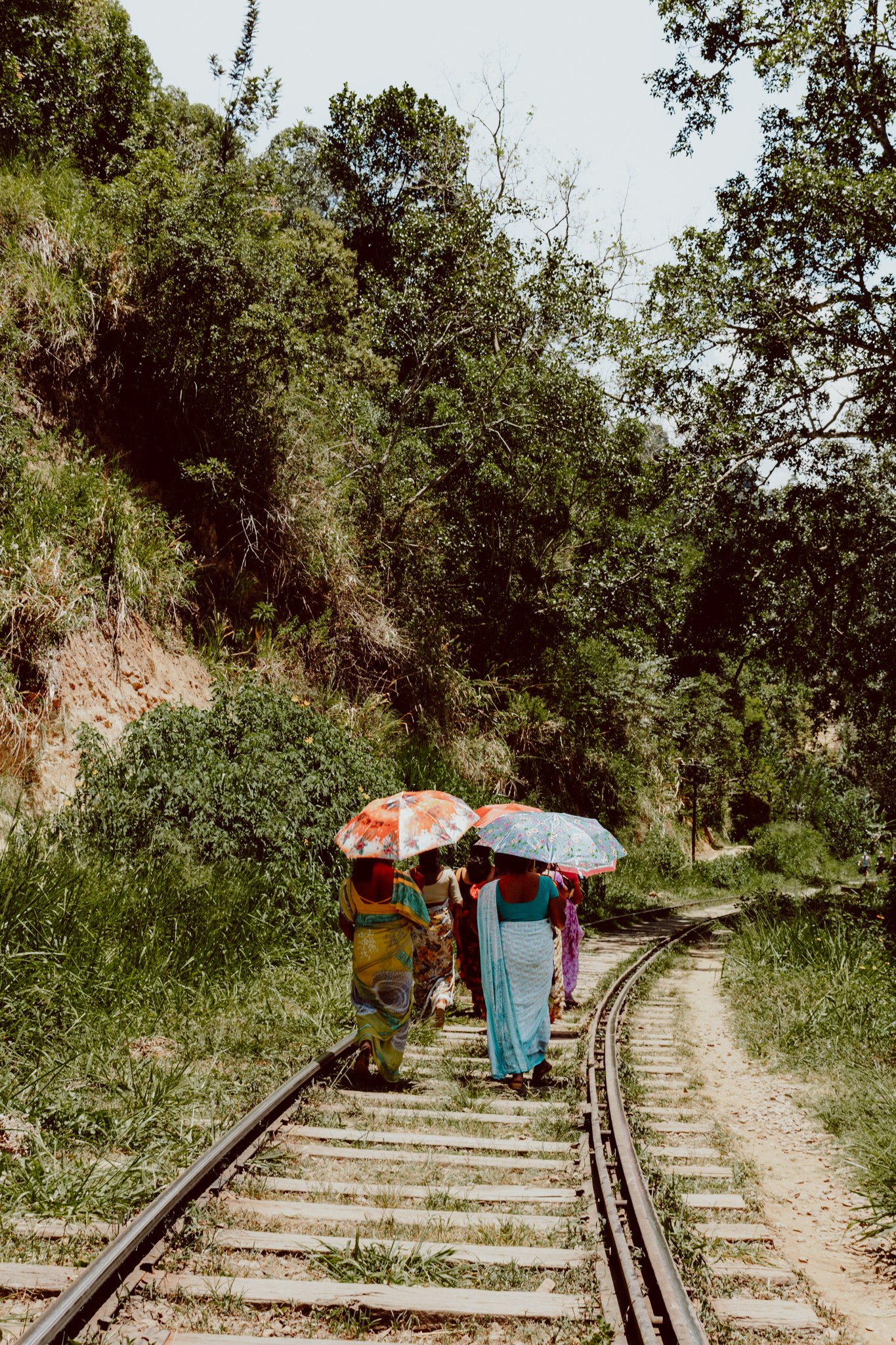 Local women walking on the tracks in Ella, Sri Lanka