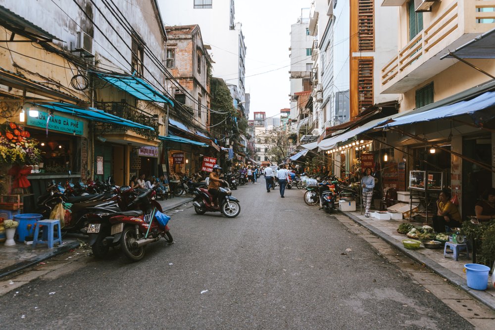 a busy local street in Hanoi, Vietnam