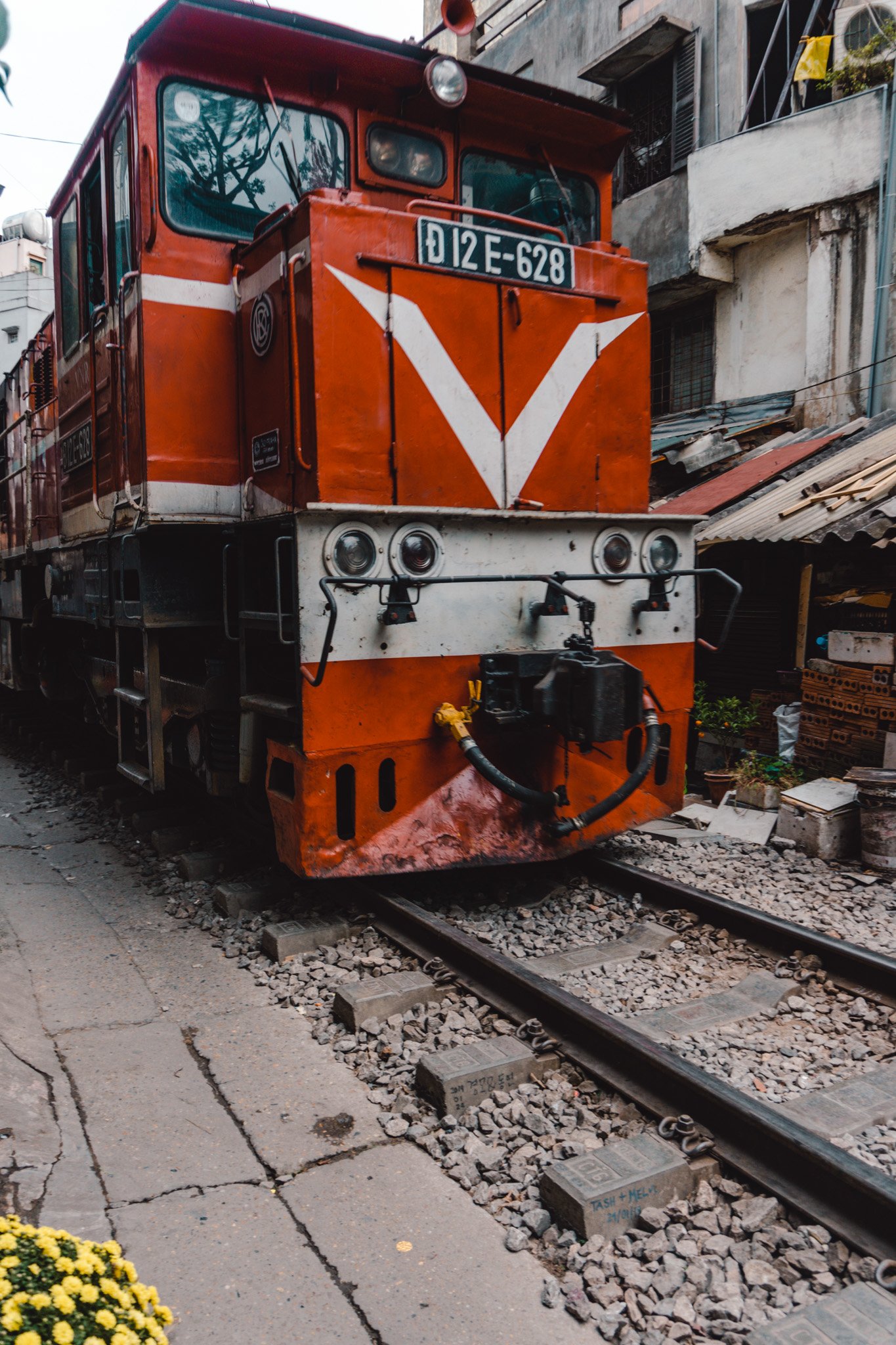 a train passing along Train Street, Hanoi, Vietnam