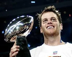 brady with trophy.jpg