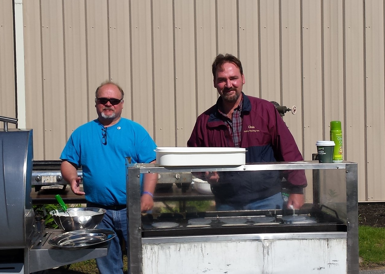 Brian and Chris cooking at last year's Blessing of the Bikes