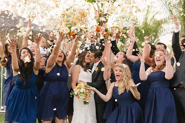 Petal shower for the win!! Ask your florist to bring extra petals for amazing pictures like this!