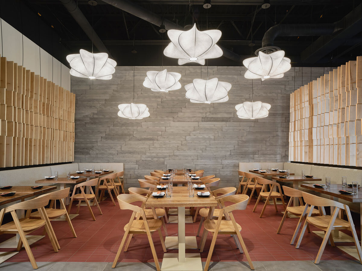 Green Walls Meet Tropical Wallpaper in Fusion Restaurant Design