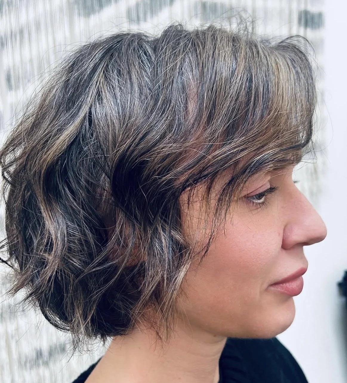 The AFTER of client’s new blended semi-permanent color transition to help camouflage new outgrowth with subtle highlighting to give a softer and more natural look.