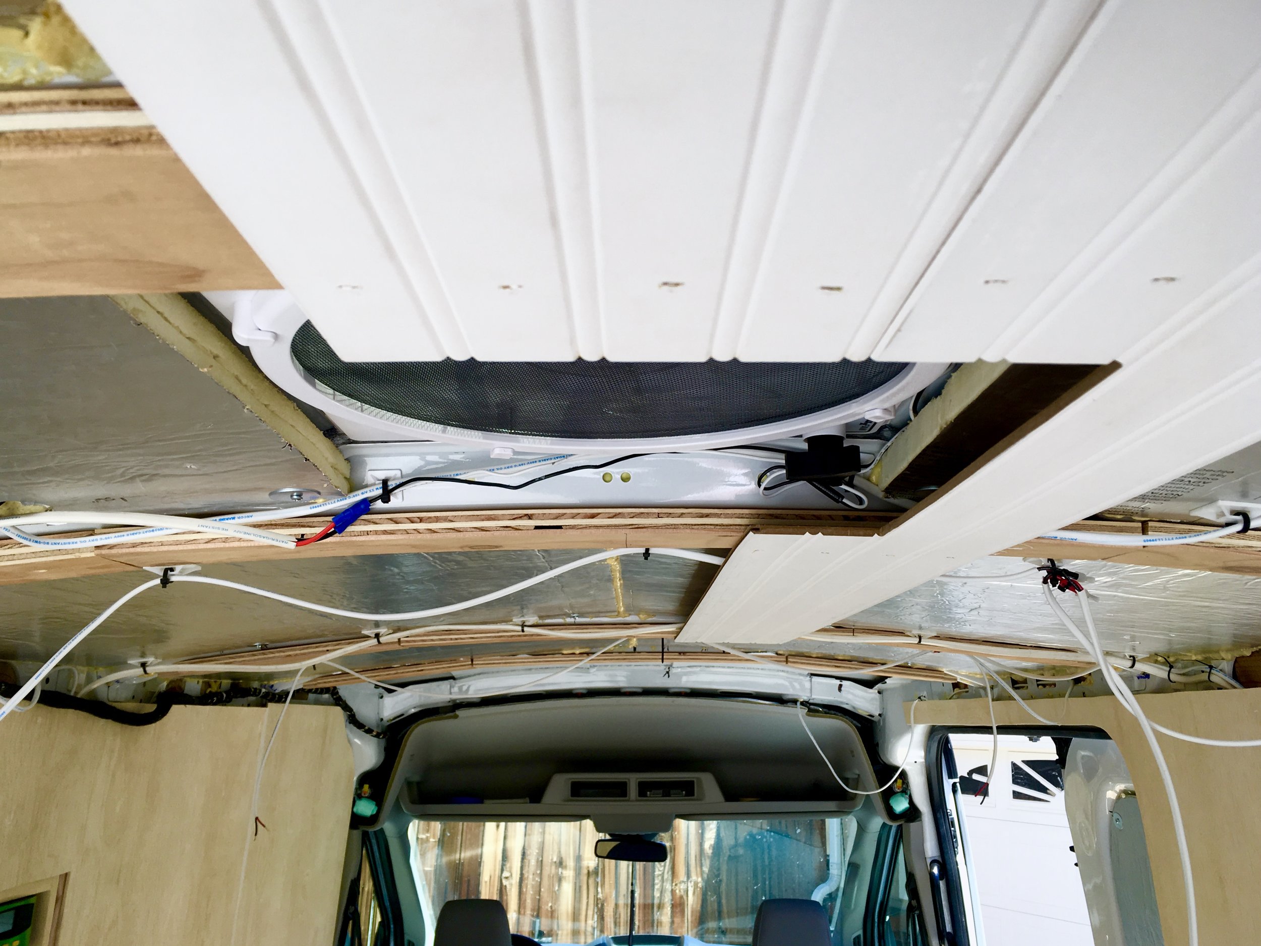 First few ceiling boards going in at the back of the van