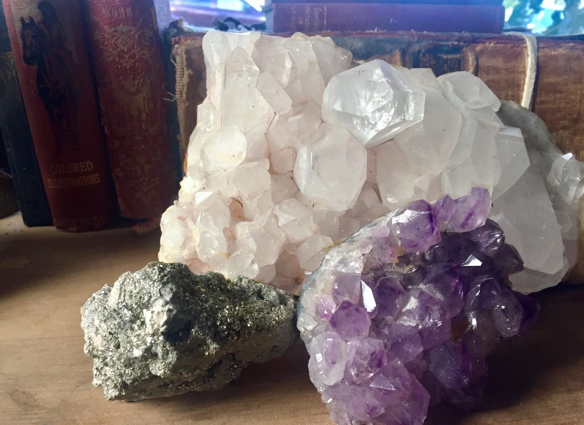 There's strength in numbers when grouping gemstones. Shown counter clockwise is pyrite, amethyst and angel quartz. Come grab your grouping at Filthy Gorgeous. 
