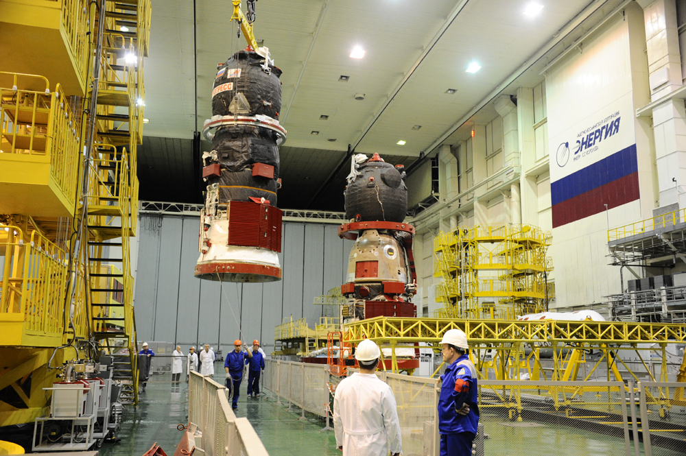 Technicians at Baikonur Cosmodrome in Kazakhstan ready a Progress for flight. Photo Credit: RKK Energia
