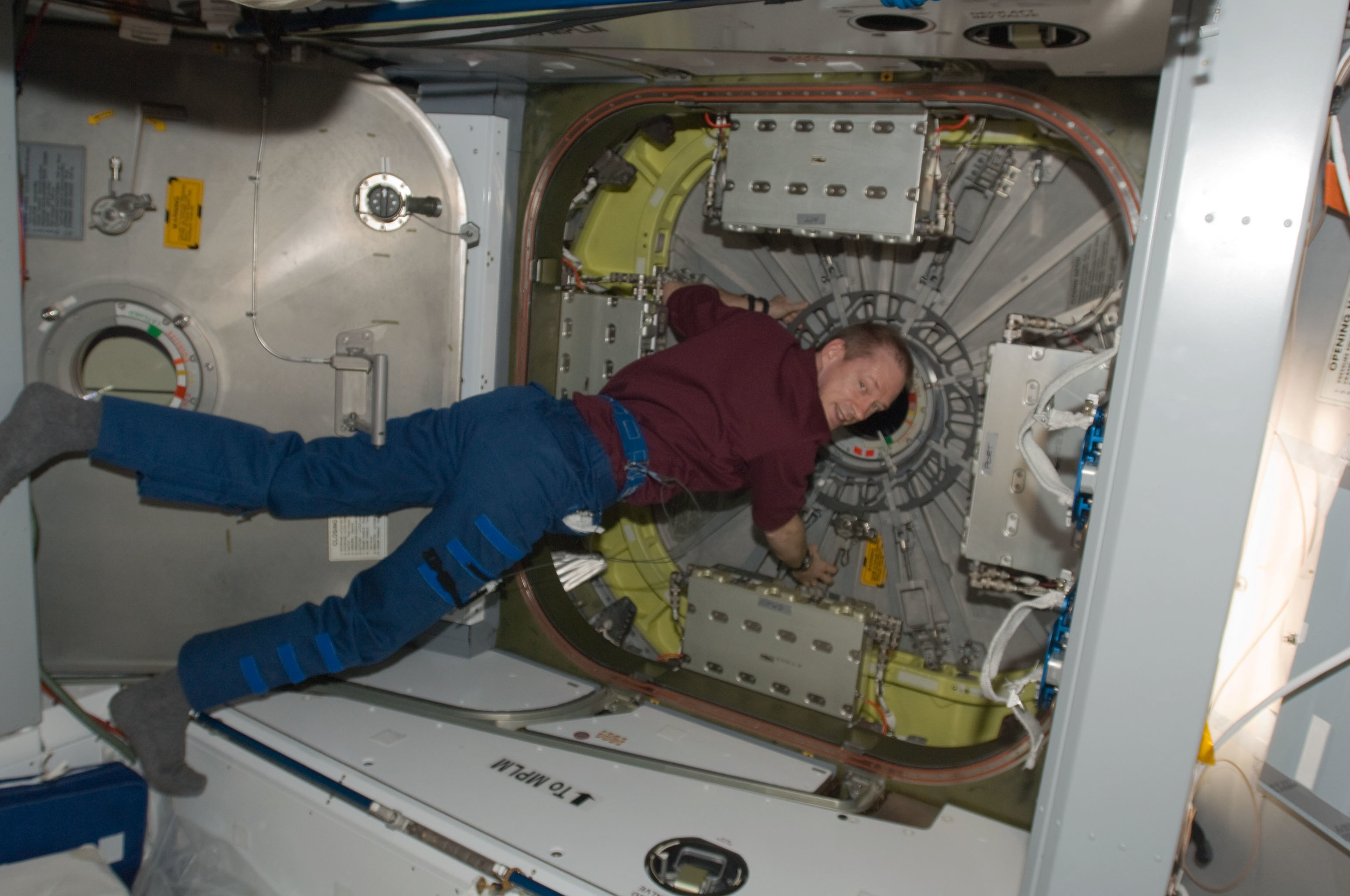  Belgium astronaut Frank De Winne prepares to open the Kounotori's hatch. Photo Credit: NASA 
